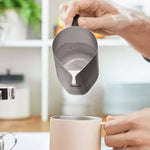 Making a latte at home with frothed milk from the Equator MiiR Milk Pitcher | Equator Coffees