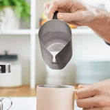 Making a latte at home with frothed milk from the Equator MiiR Milk Pitcher | Equator Coffees