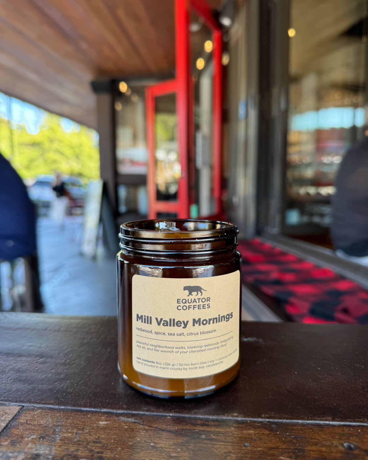 The Mill Valley Mornings candle makes an appearance at the outdoor seating area for Equator Coffees in Downtown Mill Valley | Equator Coffees